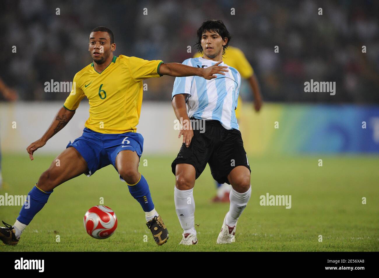 Brazil's Marcelo and Argentina's Sergio Aguero battle for the ball during the football semi-final match held at the Worker's Stadium for the 2008 Beijing Olympics, August 19, 2008. Argentina defeats Brazil 3-0. Photo by Gouhier-Hahn-Nebinger/Cameleon/ABACAPRESS.COM Stock Photo
