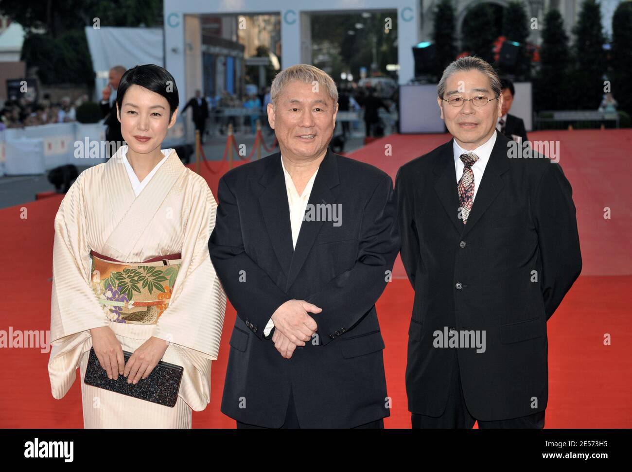 Actress Kanako Higuchi, director Takeshi Kitano and producer Masayuki Mori arrive at the 'Achilles and the Tortoise' screening during the 65th Mostra Venice Film Festival at Sala Grande in Venice, Italy on August 28, 2008. Photo by Thierry Orban/ABACAPRESS.COM Stock Photo