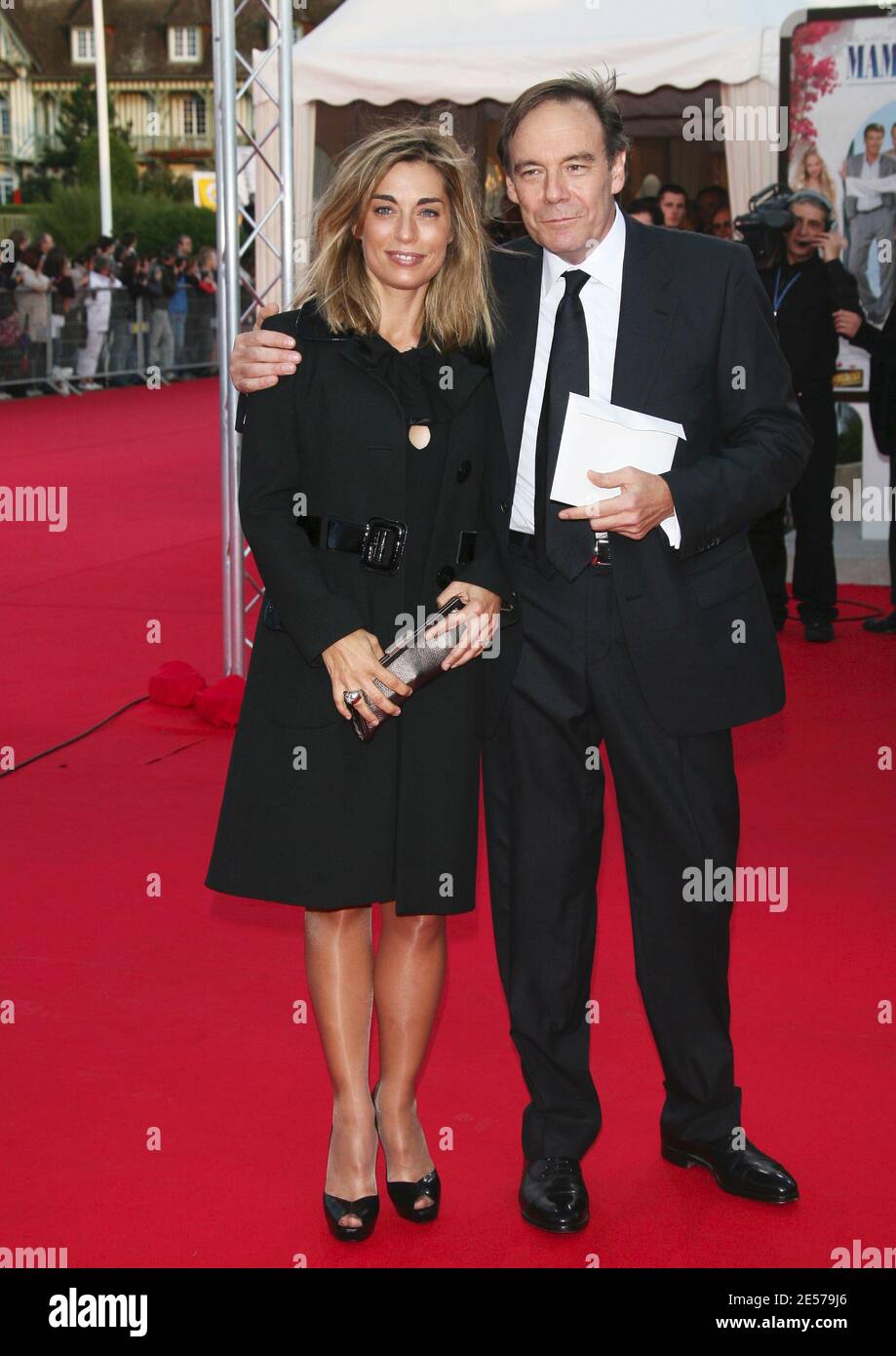 Xavier Couture and his wife arrive for the screening of 'Mamma Mia', during  the Opening Day of 34th American Film Festival at International Center in  Deauville, Normandy, France, on September 5, 2008.