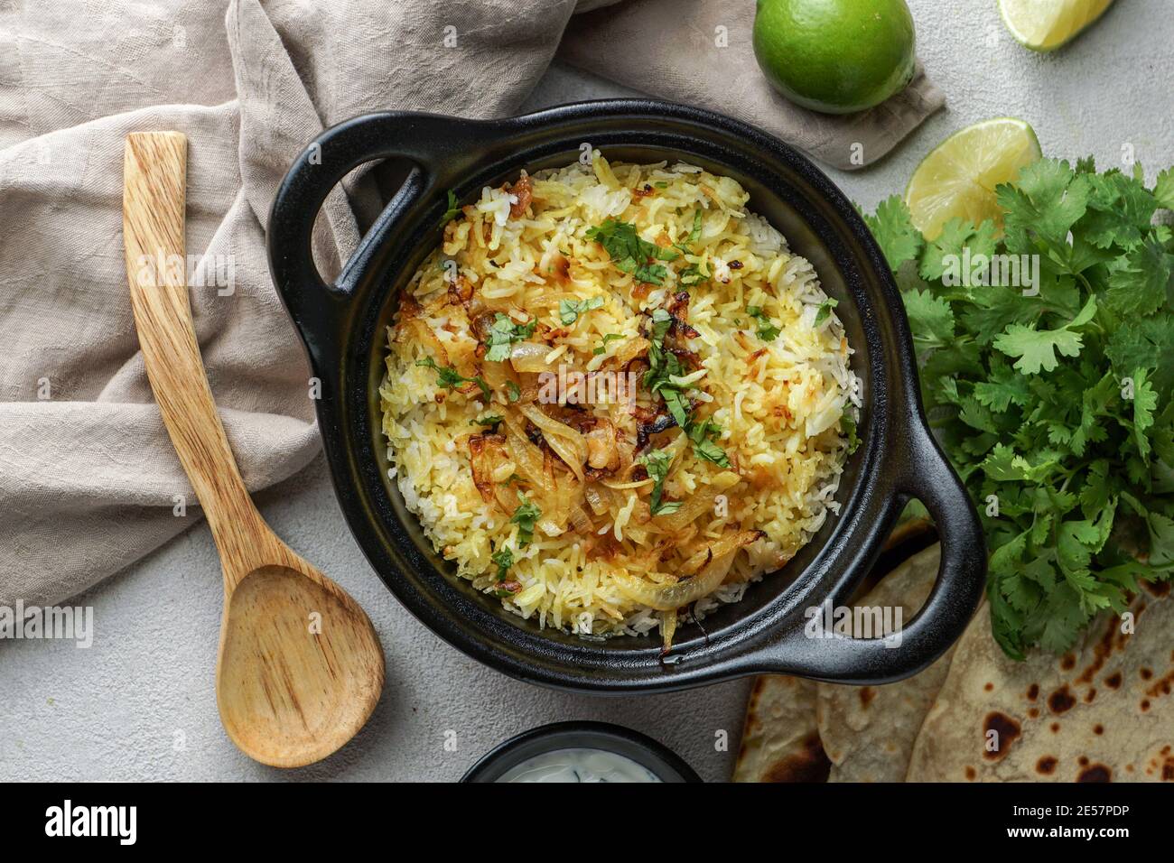Chicken Biryani indian pilaf, with flat bread Stock Photo Alamy
