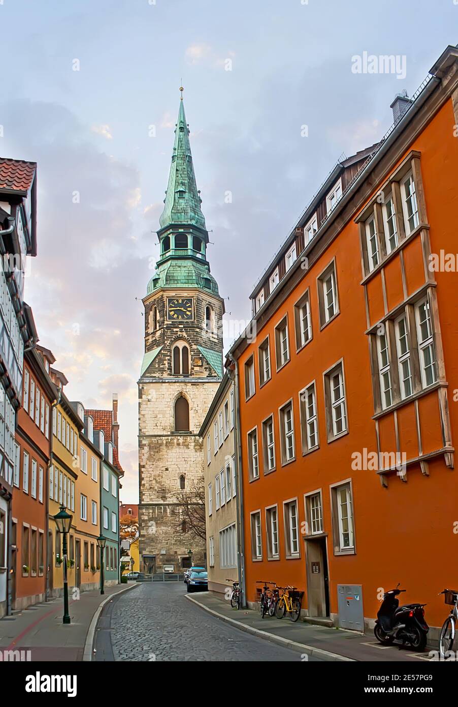 The tall spire of the clock tower of historic Kreuzkirche (Holy Cross Church), Kreuzstrasse street, Hanover, Germany Stock Photo