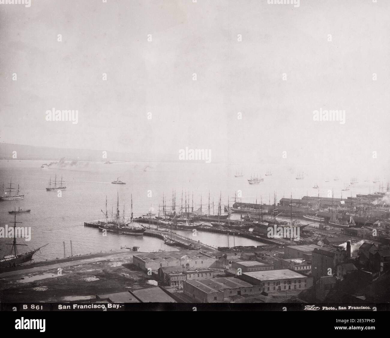 19th century vintage photograph: view of the docks, sailing ships tied up, San Francisco Bay, California, USA. Stock Photo