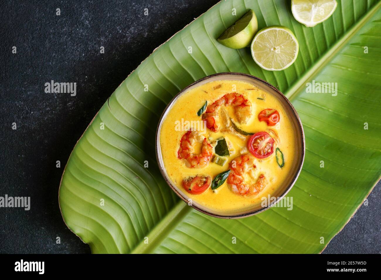 Prawn moilee, delicious south Indian curry shrimp soup with lime Stock Photo