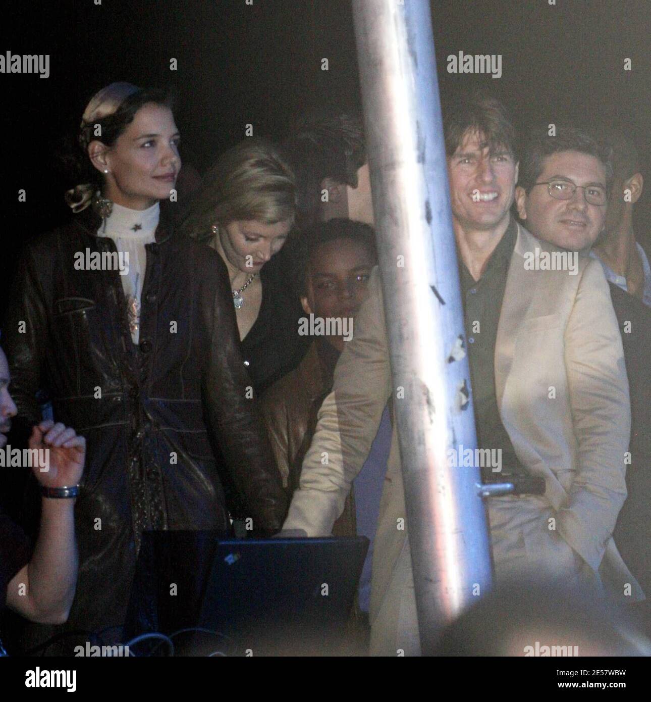 Tom Cruise and wife Katie Holmes watch Jlo and Marc Anthony perform at(00)