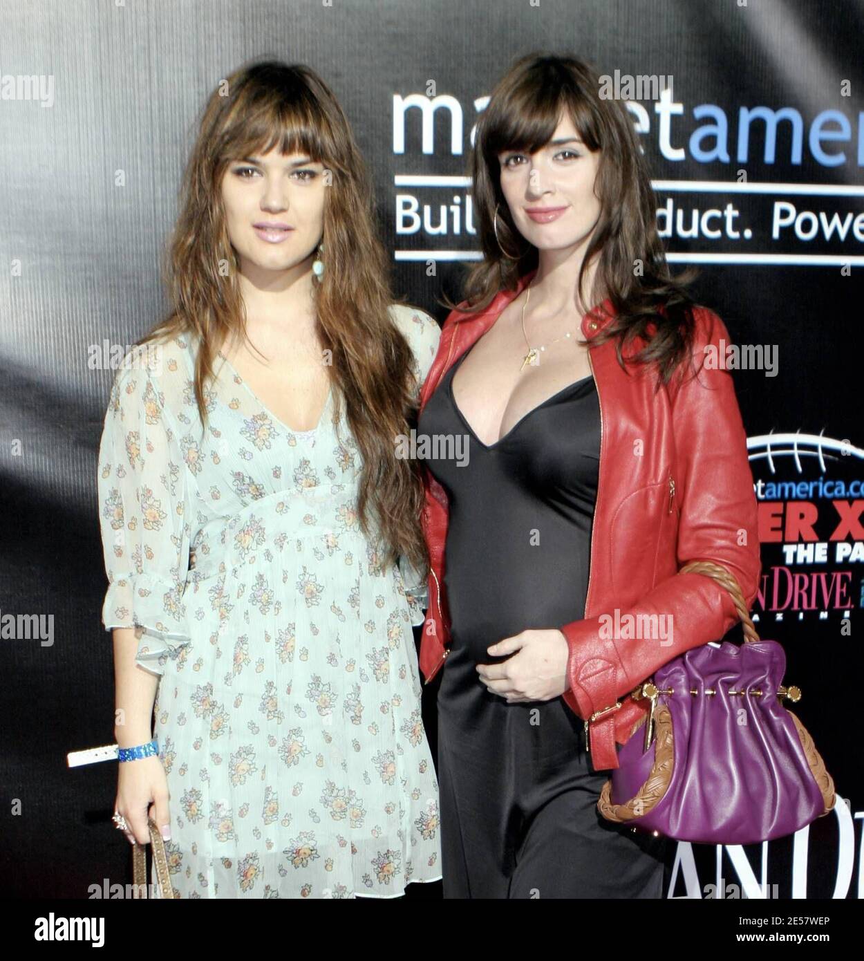 A pregnant Paz Vega and her sister Sara arrive at the Market America.com Super XLI Party in South Beach, Florida. 2/3/07    [[ral]] Stock Photo