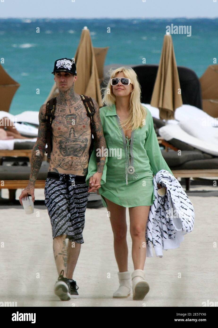 Exclusive!! Travis Barker and wife Shanna Moakler spend a second day on Miami Beach. The couple took a dip in the ocean and fooled around in their cabana before heading back to thier hotel, 3/19/07.    [[tag ccm]] Stock Photo