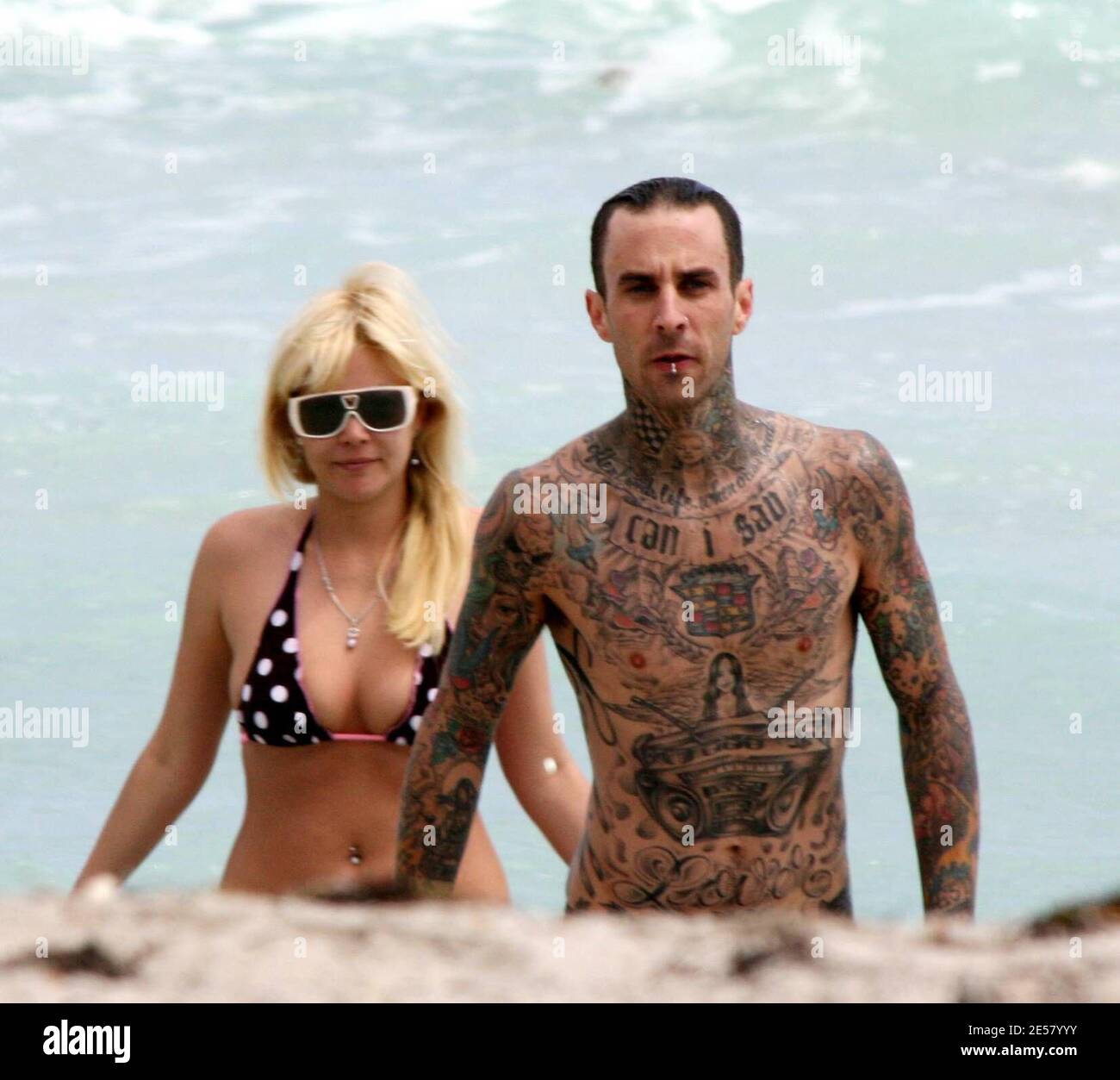 Exclusive!! Travis Barker and wife Shanna Moakler spend a second day on Miami Beach. The couple took a dip in the ocean and fooled around in their cabana before heading back to thier hotel, 3/19/07.    [[tag ccm]] Stock Photo