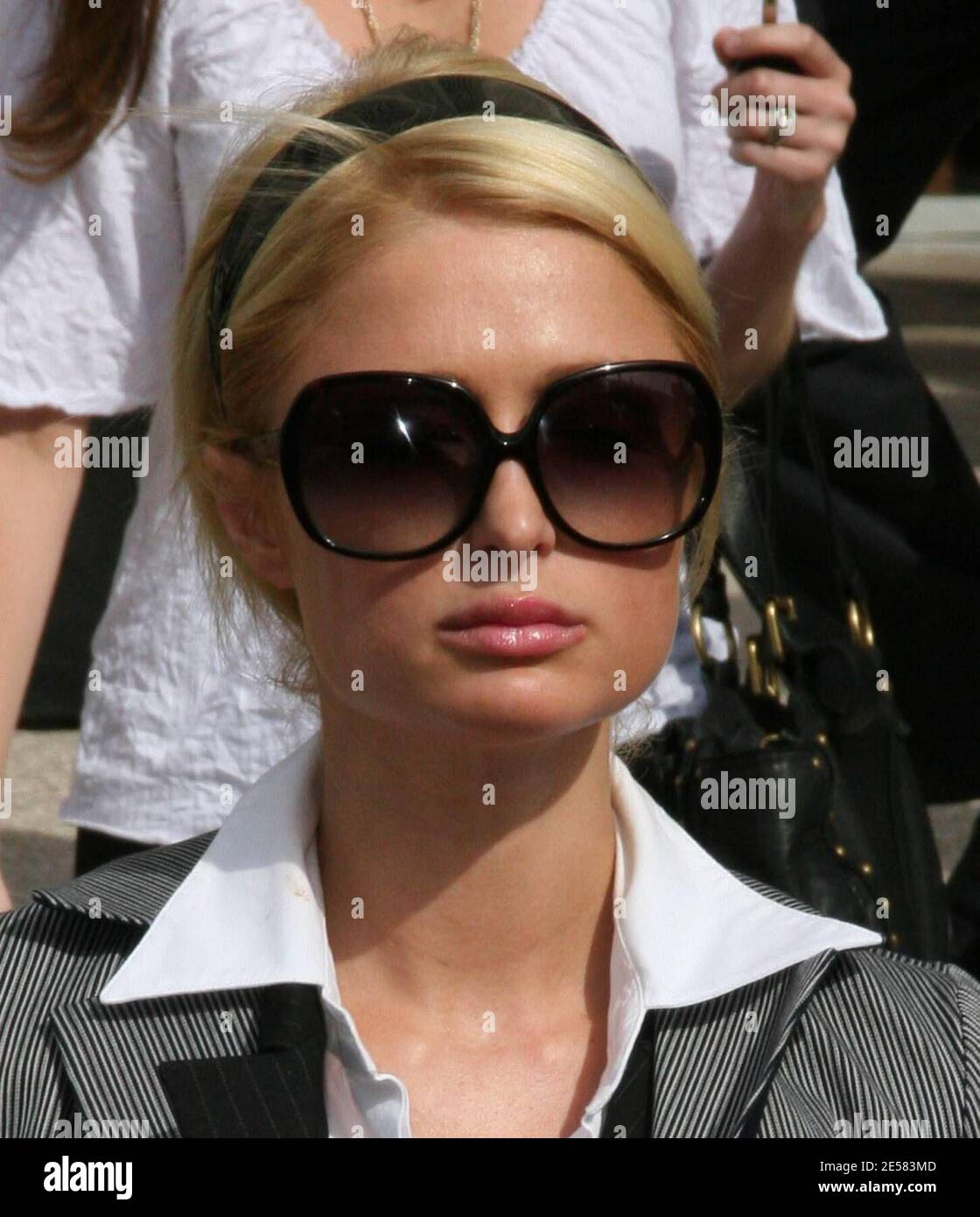 Paris Hilton broke down in tears today as she left a downtown Los