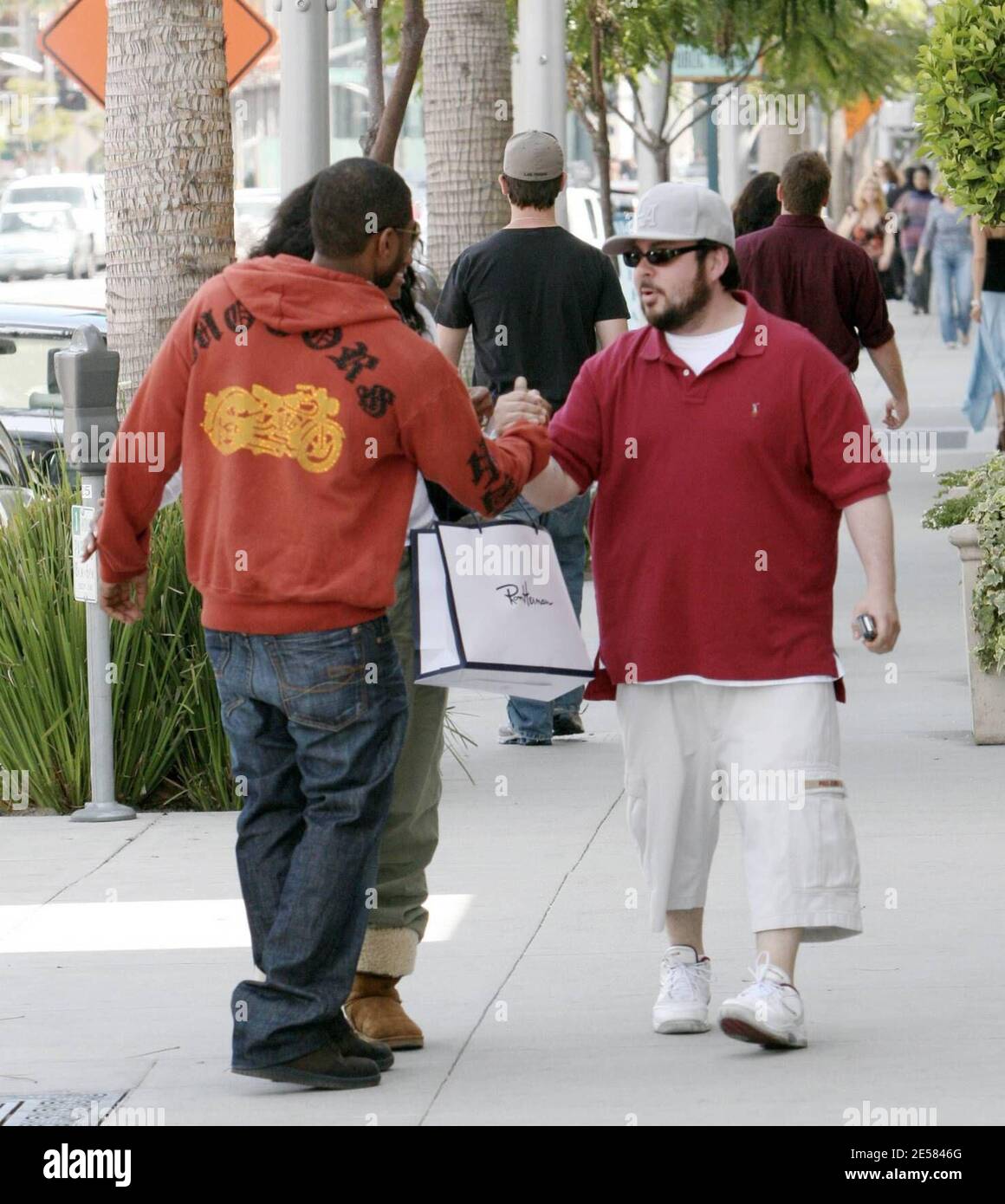 Exclusive!! Usher and his new fiancŽe, Tameka Foster, enjoy a romantic  stroll in Beverly Hills, Calif. The couple, who got engaged one month ago,  was all smiles and held hands as they