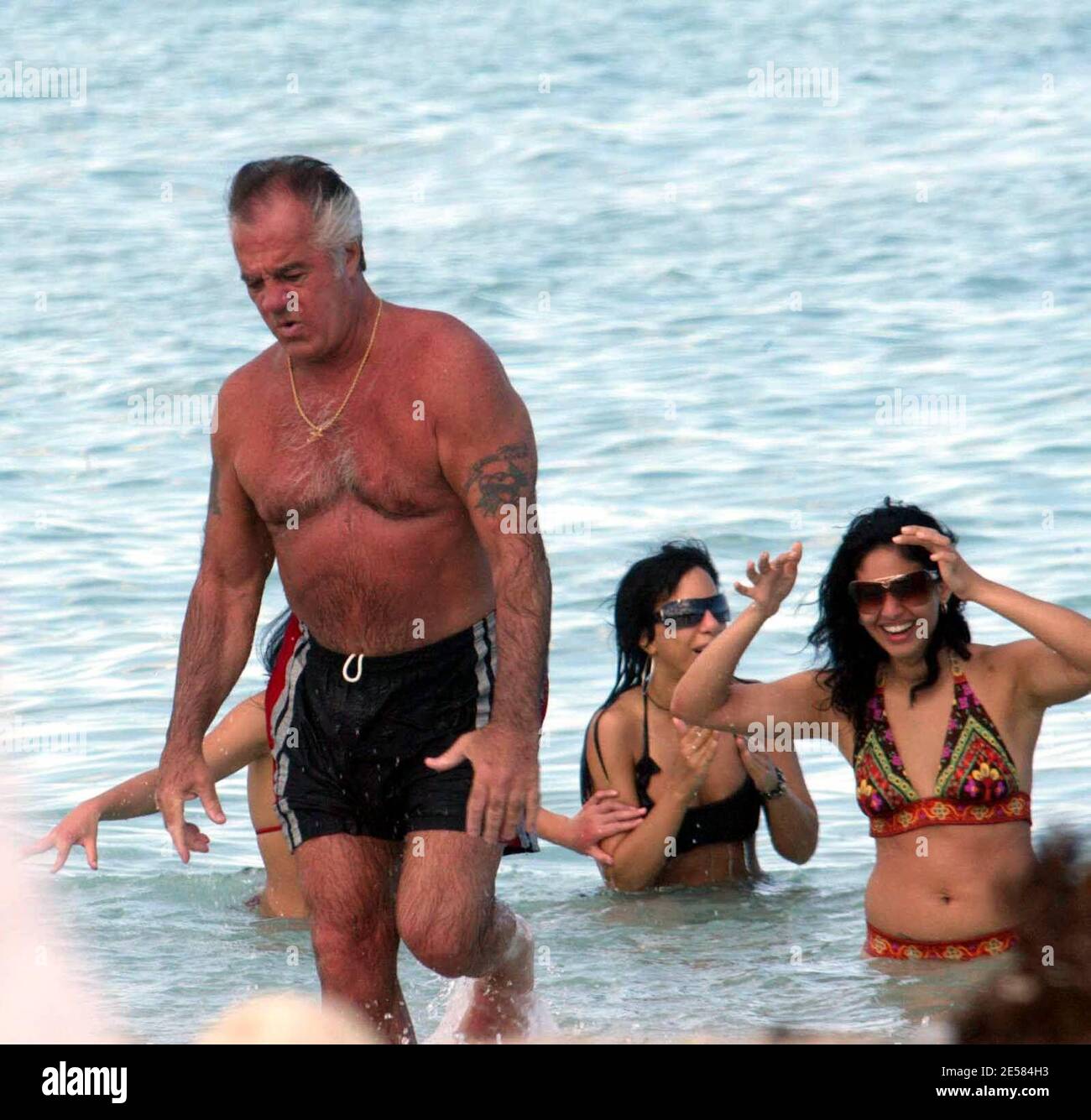 Actor Tony Sircio, Pauly Walnuts in the "Sopranos" TV series has fun with  female fans as he plays in the surf on Miami Beach, Fla. 5/10/07. [[mab]]  Stock Photo - Alamy