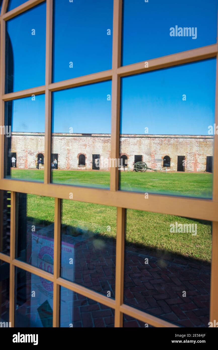 Restored windows at Fort Macon reflect the inner court known as the parade ground at Fort Macon State Park in Atlantic Beach, NC. Fort Macon was const Stock Photo
