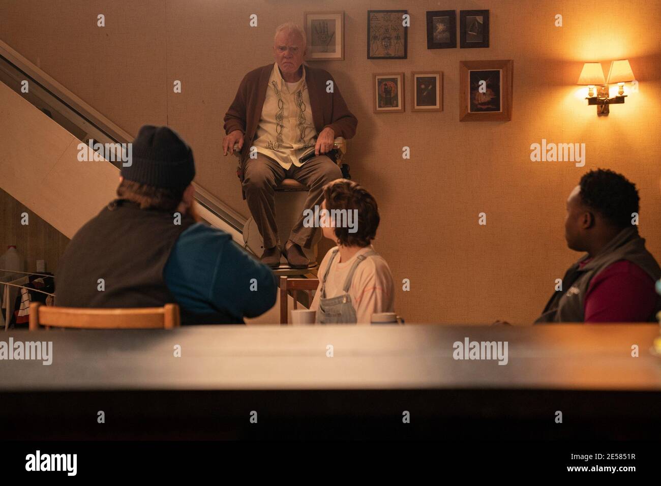 TRUTH SEEKERS, from left: Nick Frost (back to camera), Malcolm McDowell