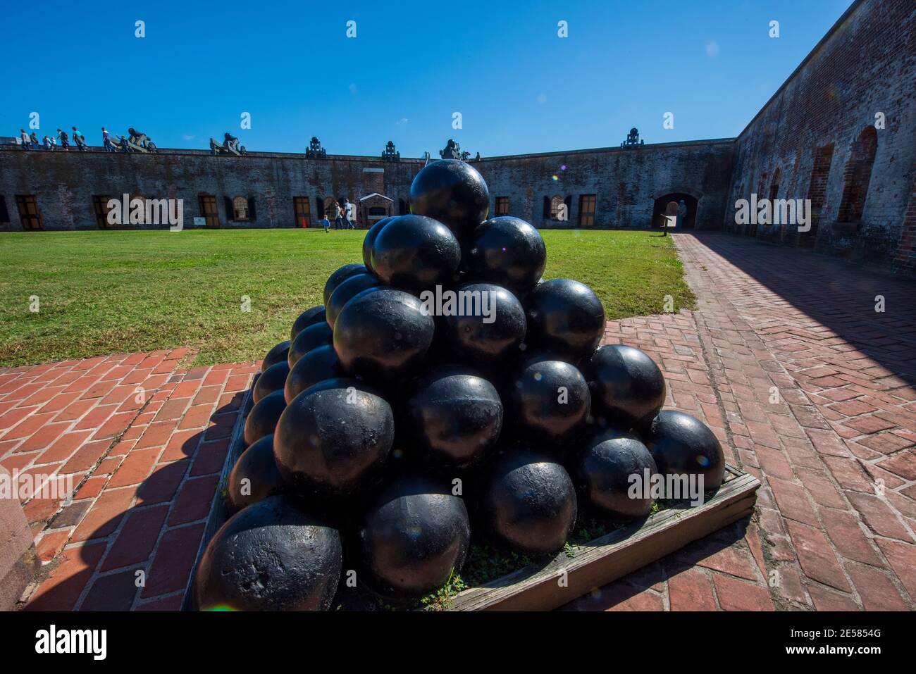 A pyramid of cannonballs at Fort Macon State Park in Atlantic Beach, NC. Fort Macon was constructed after the War of 1812 to defend Beaufort Harbor. T Stock Photo