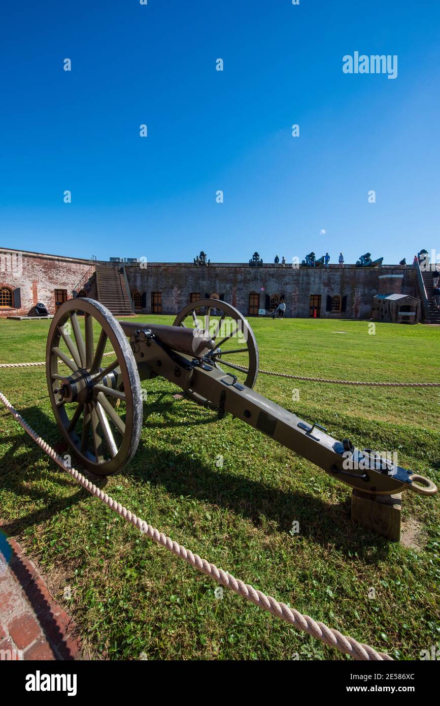 Model 1841 6-pounder field cannon at Fort Macon State Park in Atlantic Beach, NC. Smallest caliber cannon used in the American Civil War. Seven men cr Stock Photo