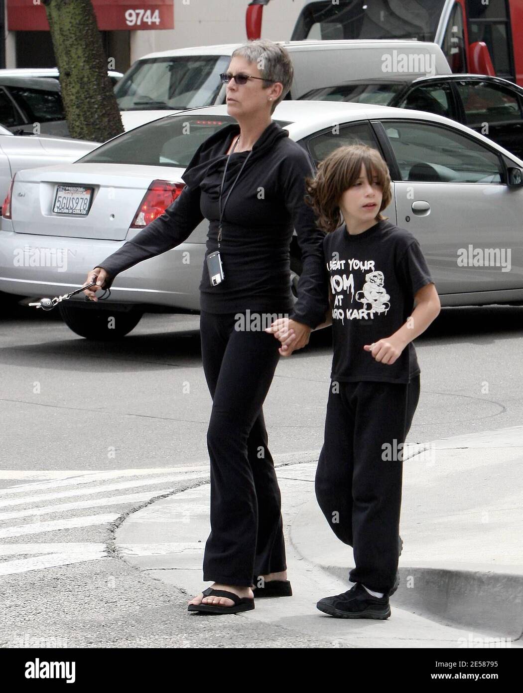 Exclusive!! Jamie Lee Curtis takes her son Thomas out and about in Beverly  Hills, Calif. Even though they stopped by a pharmacy, it seemed that there  was nothing wrong with the active