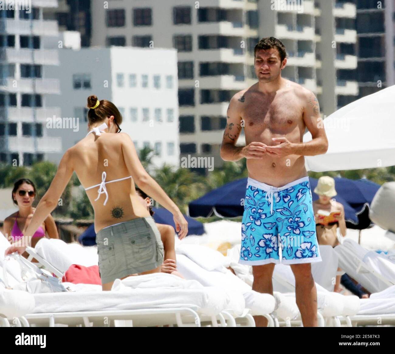 Italian soccer star Christian 'Bobo' Vieri and super hot girlfriend Melissa Satta enjoy the sun and surf on Miami Beach, Fla. 6/3/07.  [[tag]] Stock Photo