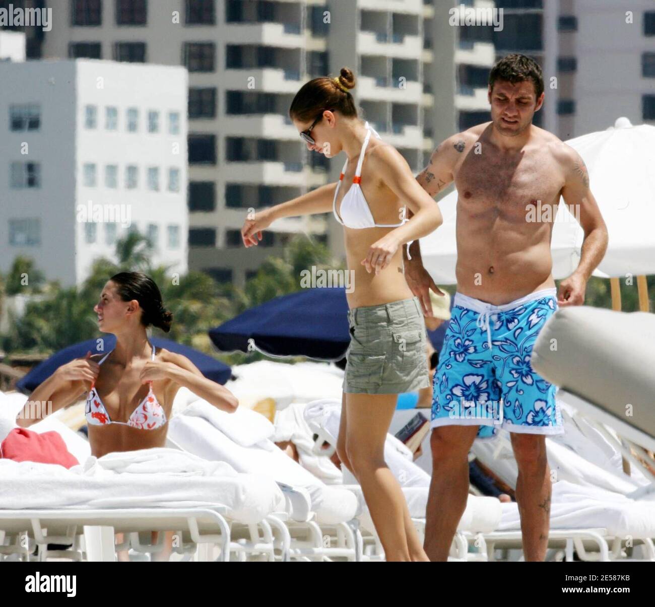 Italian soccer star Christian 'Bobo' Vieri and super hot girlfriend Melissa Satta enjoy the sun and surf on Miami Beach, Fla. 6/3/07.  [[tag]] Stock Photo