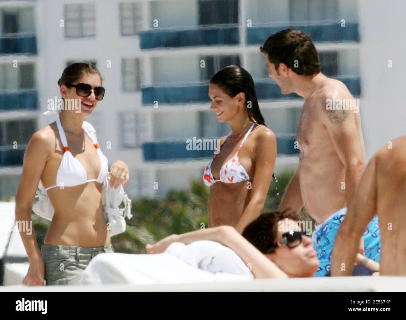 Italian soccer star Christian 'Bobo' Vieri and super hot girlfriend Melissa Satta enjoy the sun and surf on Miami Beach, Fla. 6/3/07.  [[tag]] Stock Photo