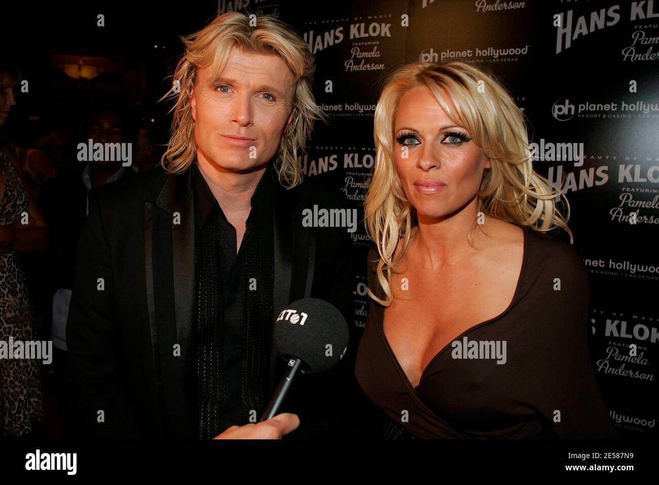 Pamela Anderson and Hans Klok at "The Beauty of Magic" at the Planet  Hollywood Resort & Casino Theater for the Performing Arts. The stage  spectacular combines the illusions of Klok, fresh off
