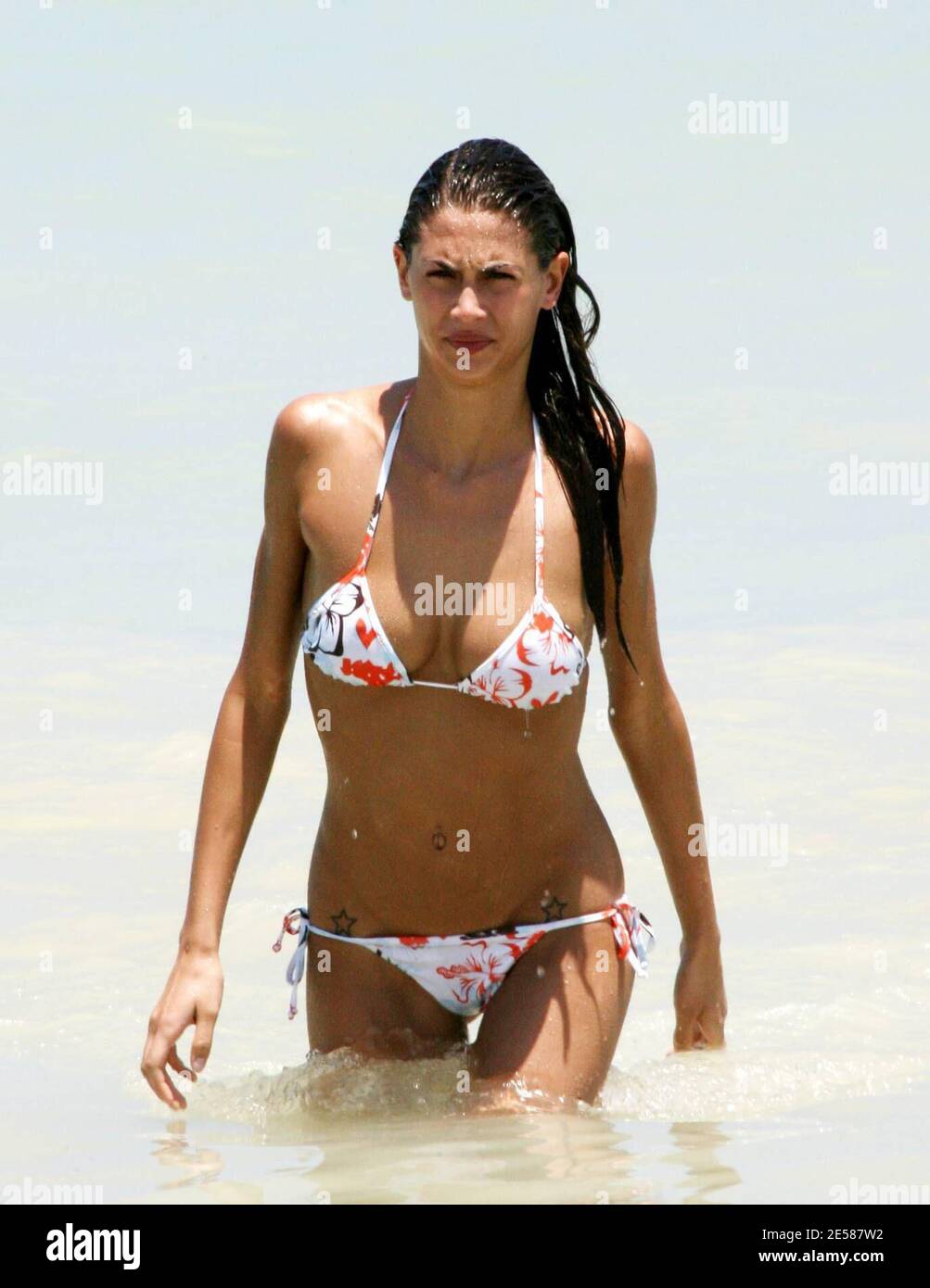 Italian soccer star Christian 'Bobo' Vieri and super hot girlfriend Melissa Satta enjoy the sun and surf on Miami Beach, Fla. 6/3/07.  [[tag]] Stock Photo