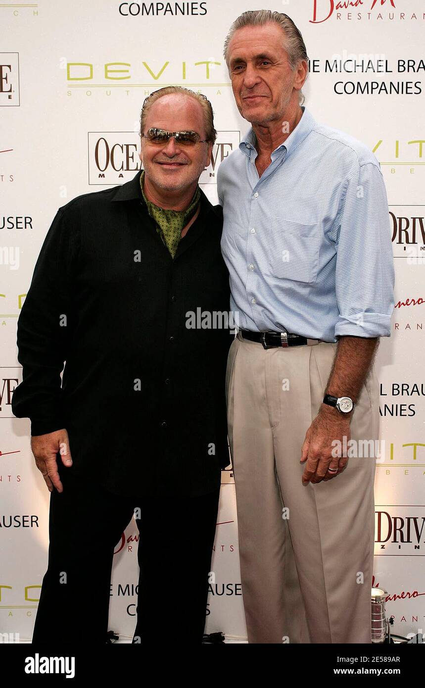 Miami Heat Coach Pat Riley and Co-owner David Manero (L) arrive for the grand opening of Devito South Beach Restaurant. Miami Beach, Fla. 6/13/07. Devito South Beach Restaurant, Miami Beach FL.    [[FAM]] Stock Photo