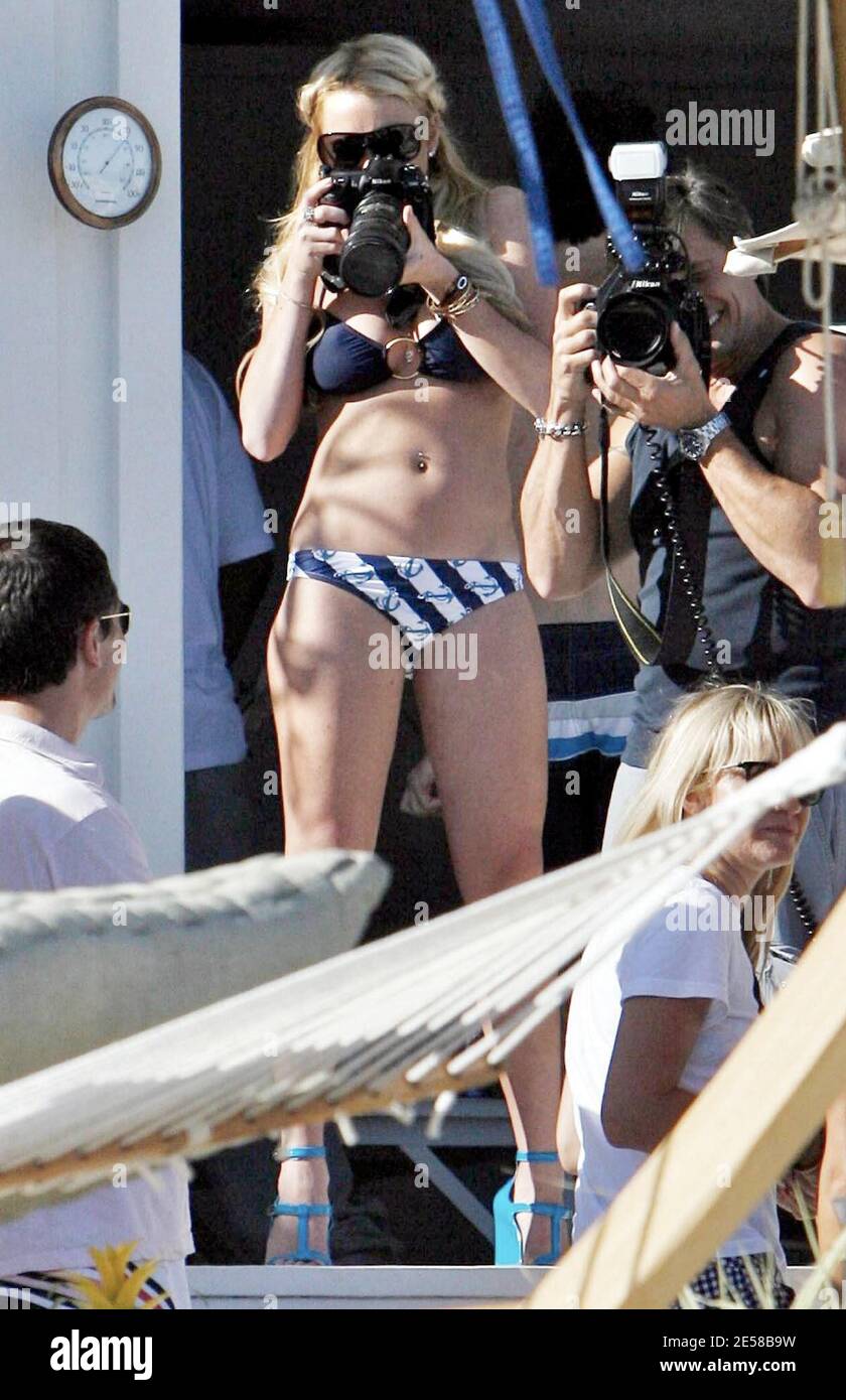 Lindsay Lohan celebrates her 21st birthday during a party with family and  friends at a beach house. The troubled star, fresh out of rehab, spent the  day in a bikini taking photos