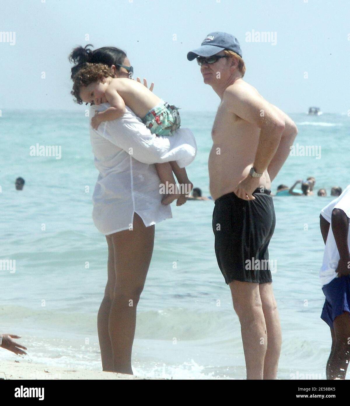 Exclusive!! CSI: Miami star David Caruso and girlfriend Liza Marquez, who  are expecting their second child together, spent Independence Day on the  beach with their son Marquez Anthony. Miami, Fla. 7/4/07. [[mab]]