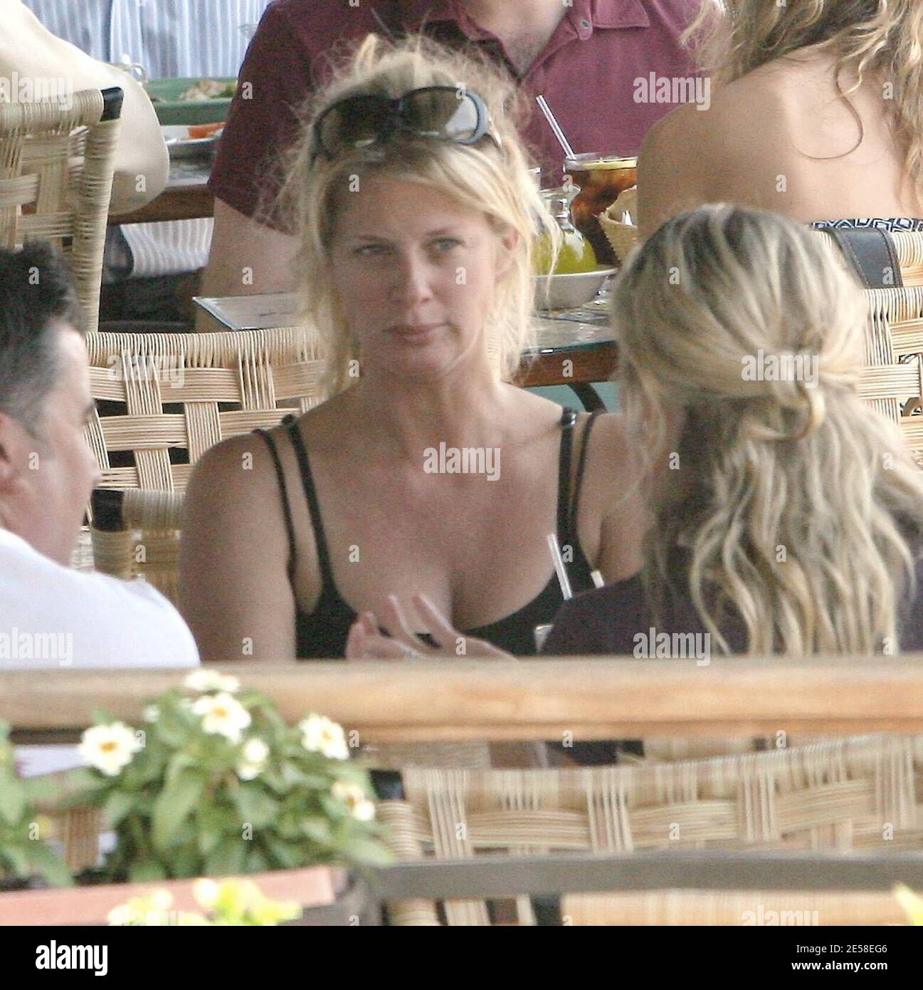 Rachel Hunter and British DIY expert and tv presenter, Phil Turner, lunch at Cafe Med with friends. 'We have a new reality show,' they joked. 'We can't talk about it, it's top secret' added Turner giggling with Hunter as they left. West Hollywood, Calif. 7/25/07.  [[rac ral]] Stock Photo