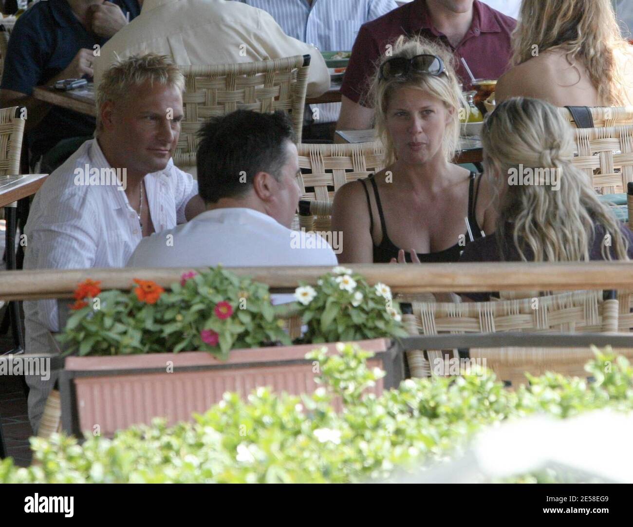 Rachel Hunter and British DIY expert and tv presenter, Phil Turner, lunch at Cafe Med with friends. 'We have a new reality show,' they joked. 'We can't talk about it, it's top secret' added Turner giggling with Hunter as they left. West Hollywood, Calif. 7/25/07.  [[rac ral]] Stock Photo