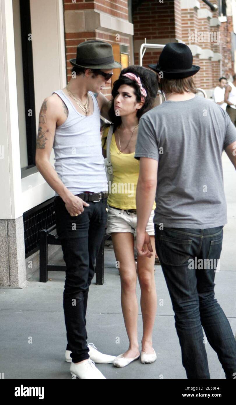 Amy Winehouse and husband Blake Fielder-Civil chat with a friend outside of their hotel. New York, NY. 8/1/07.   [[faa]] Stock Photo