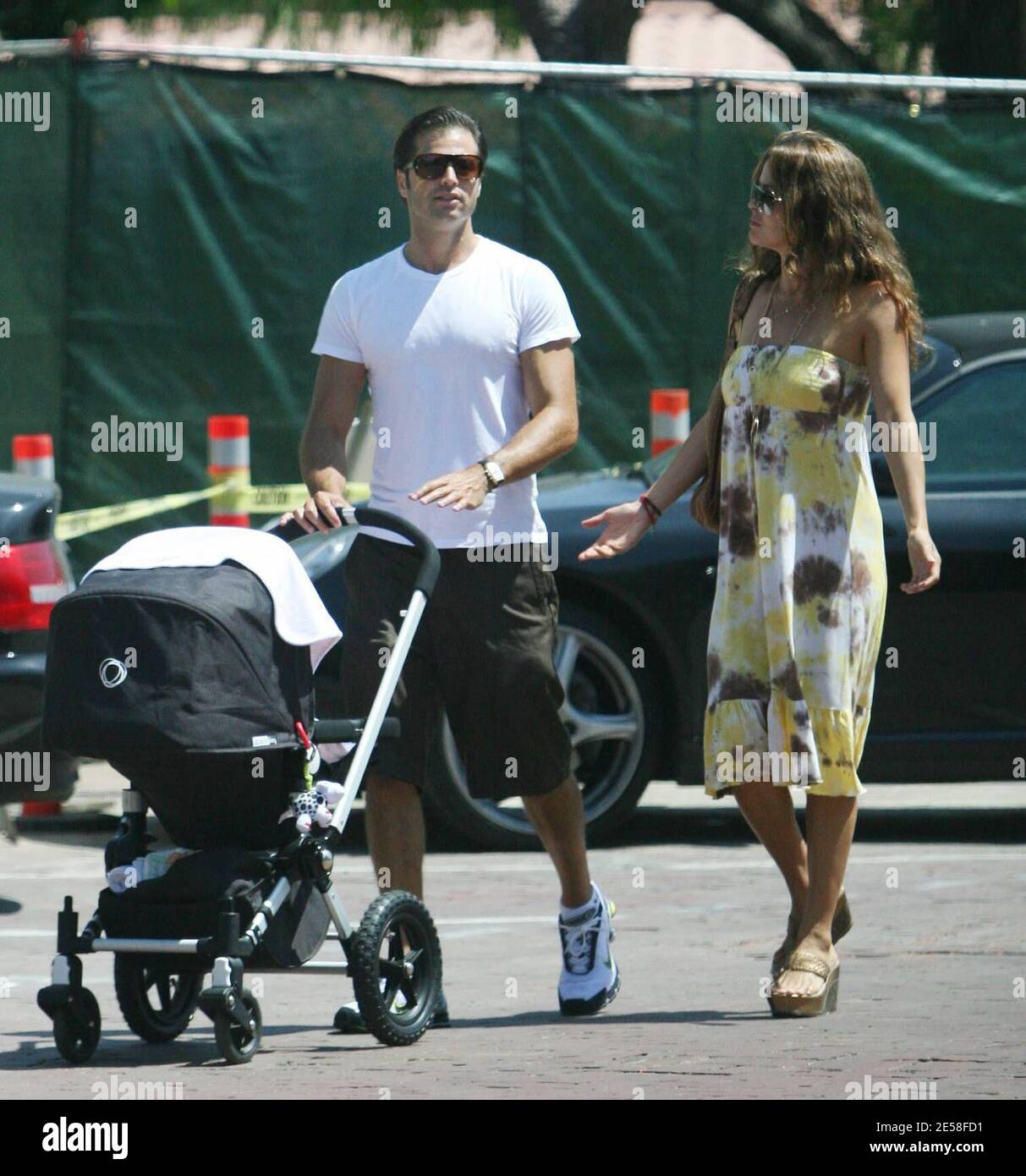 Exclusive!! Brooke Burke, David Charvet and 6-month-old daughter, Heaven Rain, spend the day in Malibu with what appears to be two doting grandparents. Charvet was a hands-on dad, holding his daughter for most of the family lunch and pushing the stroller. Malibu, Calif. 8/5/07.   [[rac ral]] Stock Photo