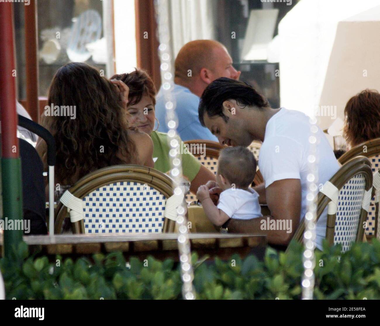 Exclusive!! Brooke Burke, David Charvet and 6-month-old daughter, Heaven Rain, spend the day in Malibu with what appears to be two doting grandparents. Charvet was a hands-on dad, holding his daughter for most of the family lunch and pushing the stroller. Malibu, Calif. 8/5/07.   [[rac ral]] Stock Photo