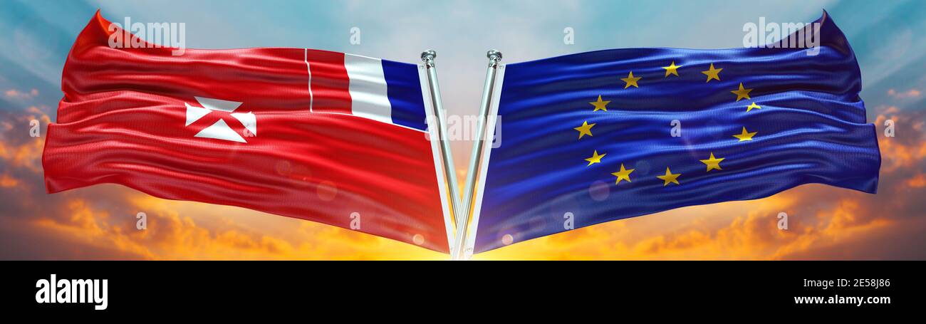 European Union Flag and Wallis and Futuna flag waving with texture sky Cloud and sunset Double flag Stock Photo