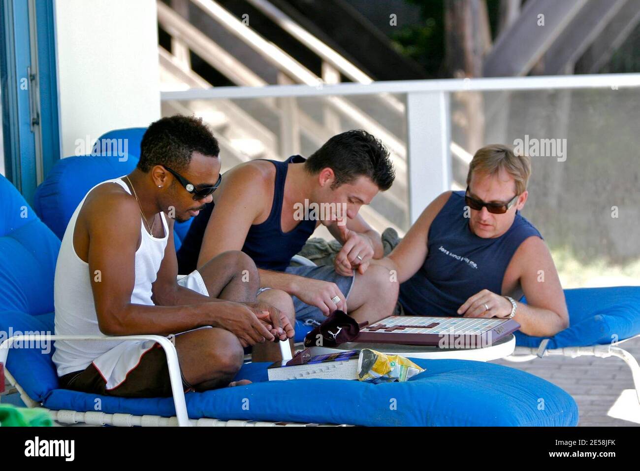 Exclusive!! Sordid Lives actor Jason Dottley, hubby Del Shores and other BFF and Sordid Lives co-star T. Ashanti Mozelle played Scrabble  and relaxed at the beach house in Malibu where Jason and Del got married. Looks like they are having one last weekend of summer before heading to Louisiana to film Sordid Lives the series. Los Angeles, Calif. 9/1/07. [[laj]] Stock Photo