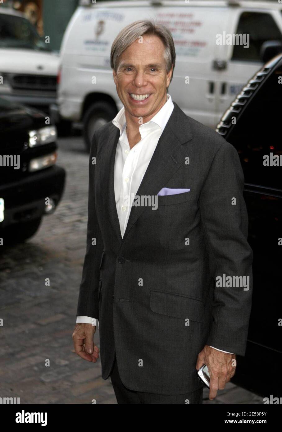 Mania dress up Manhattan Tommy Hilfiger and son Rich, who is co-ceo of Young Rich and Famous  Entertainment, make their way back into a hotel in Soho, NY. 10/4/07.  [[faa]] Stock Photo - Alamy