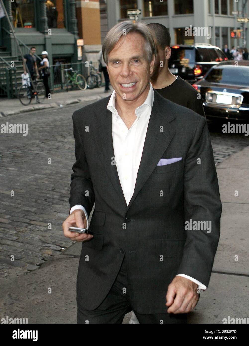 Tommy Hilfiger and son Rich, who is co-ceo of Young Rich and Famous  Entertainment, make their way back into a hotel in Soho, NY. 10/4/07.  [[faa]] Stock Photo - Alamy