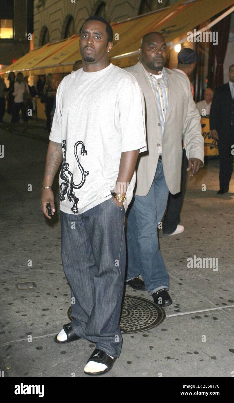 Exclusive!! P Diddy puts in a hard day at the office. Diddy, dressed down  in jeans, flip flops and socks, was spotted leaving his Bad Boy  Entertainment headquarters after dark. New York,