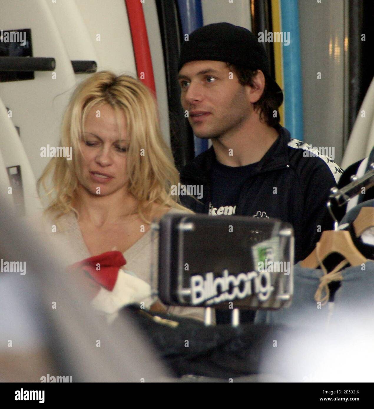 Exclusive!! Pamela Anderson and her husband Rick Salomon go Christmas  shopping for the kids at a surfing store near Anderson's home. The actress  was still without a wedding ring and was dressed