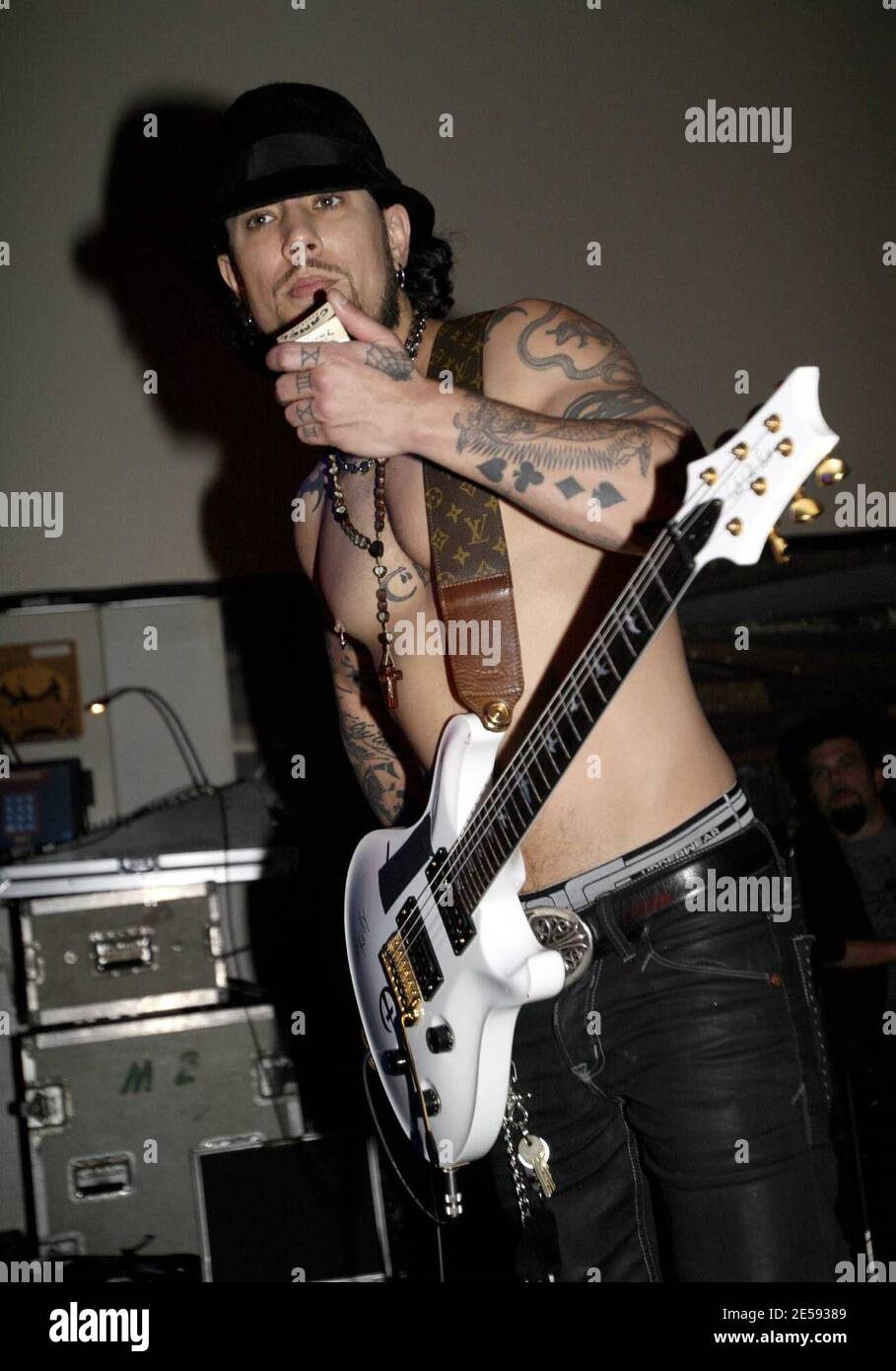 Dave Navarro and DJ Skribble perform live at The Pawn Shop Lounge. Navarro  was very stylish with his Louis Vuitton guitar strap and as usual, seemed  to love all the female attention