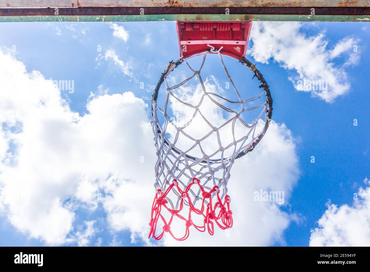 Basketball hoop on blue sky and cloud Stock Photo Alamy