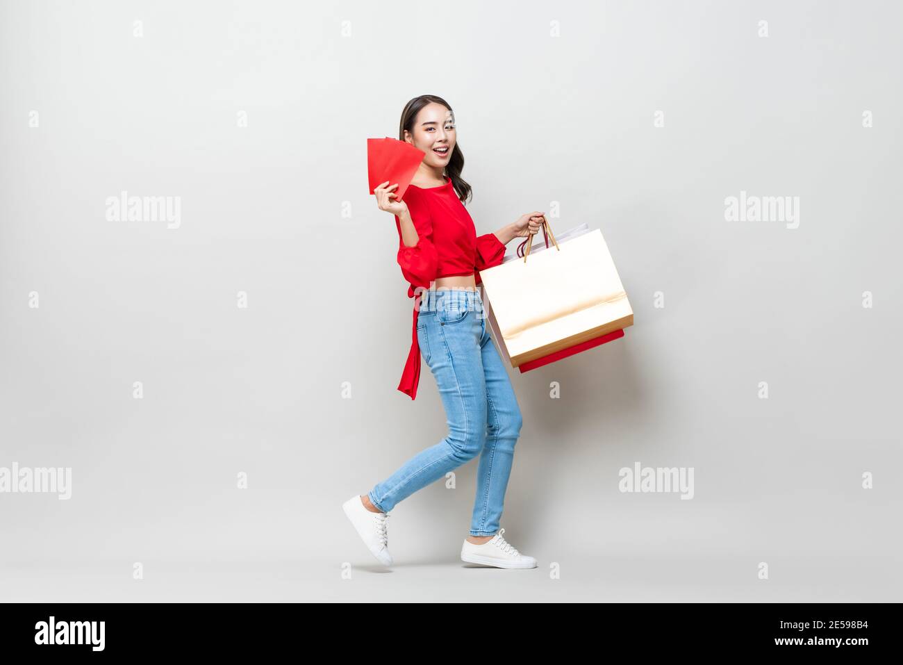 muffled-bat943: a person holding a bunch of red envelopes, instagram  contest winner, gucci, dressed in red paper bags, giving gifts holding  gift, 3 colour, from china, gifts, invitation card, gucci, guccimaze, 1 
