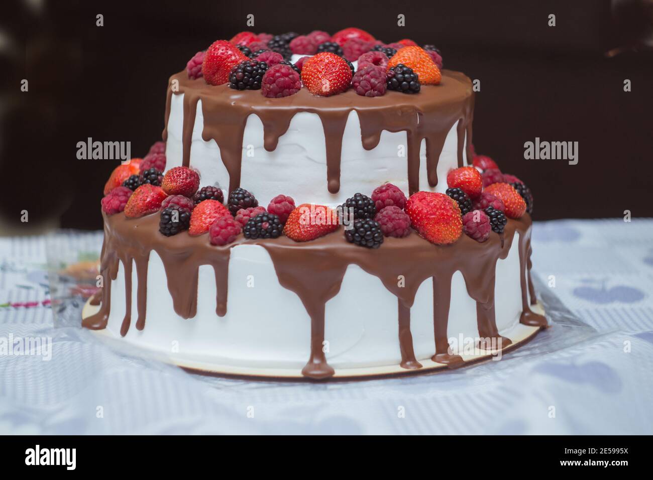 cake with chocolate and sweet summer berries dessert Stock Photo