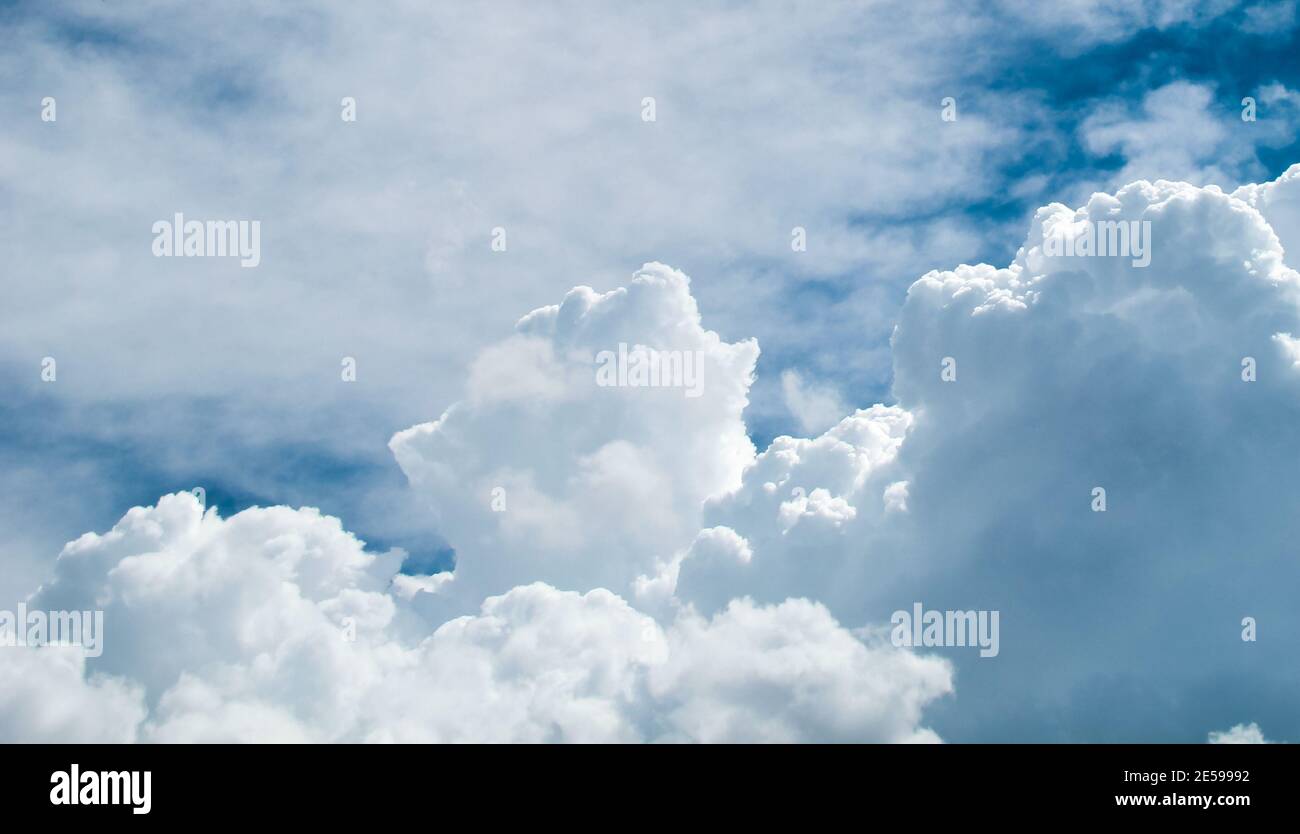 blue sky background with white clouds vertical Stock Photo - Alamy