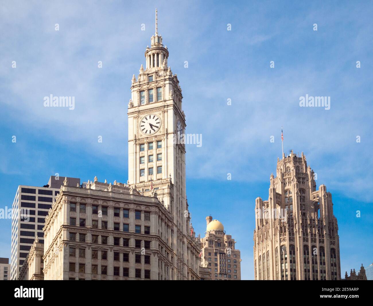 A view of the Wrigley Building (left), InterContinental Chicago [South Tower] (center), and Tribune Tower (right) in Chicago, Illinois. Stock Photo