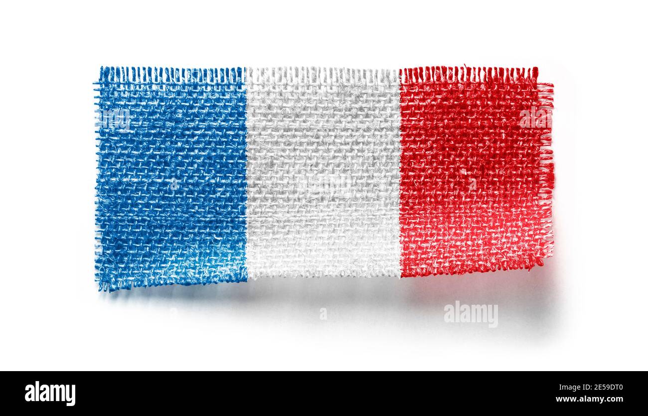 France flag on a piece of cloth on a white background Stock Photo