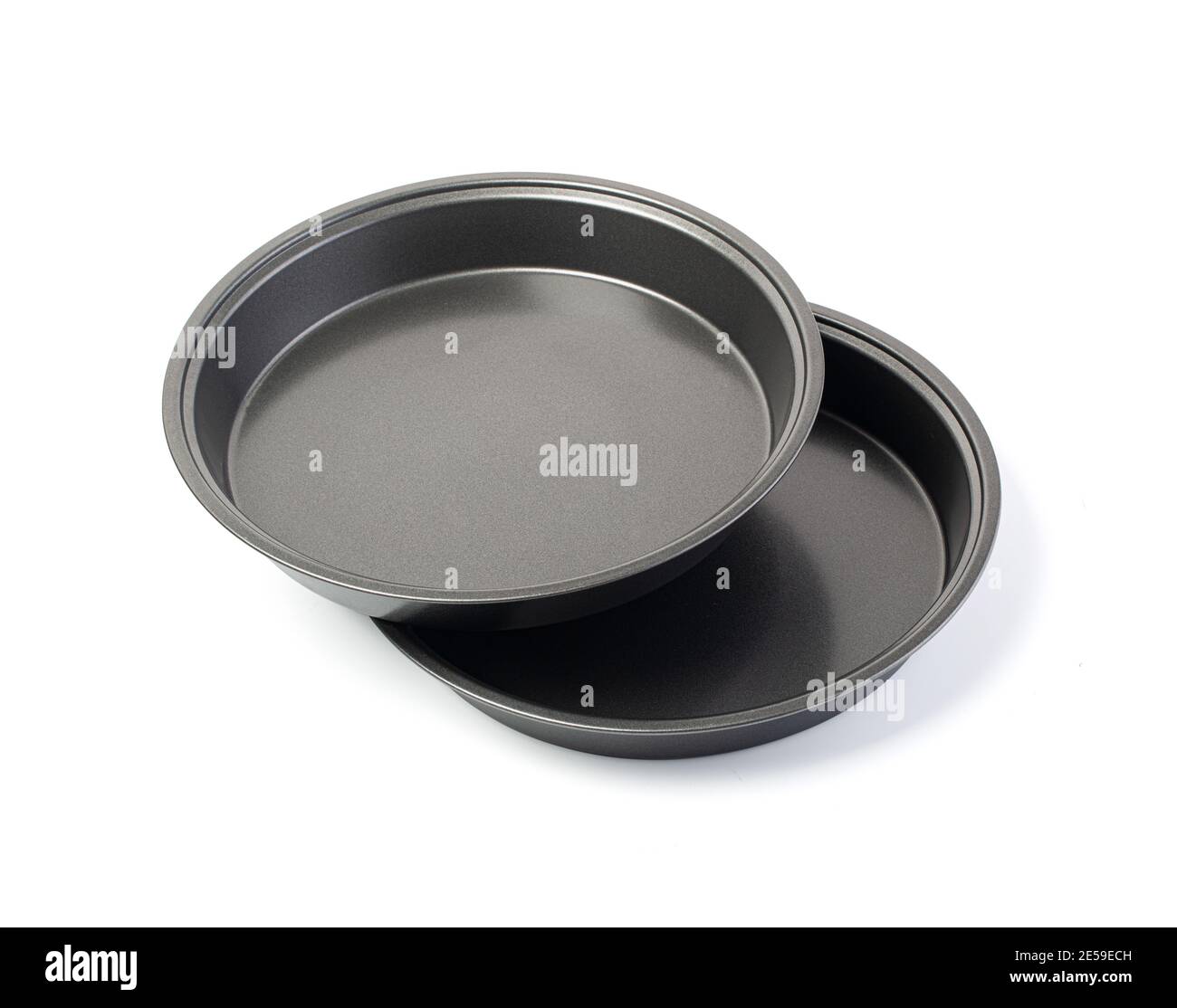 Black Metallic nonstick Pizza pans isolated on white background.With clipping path Stock Photo