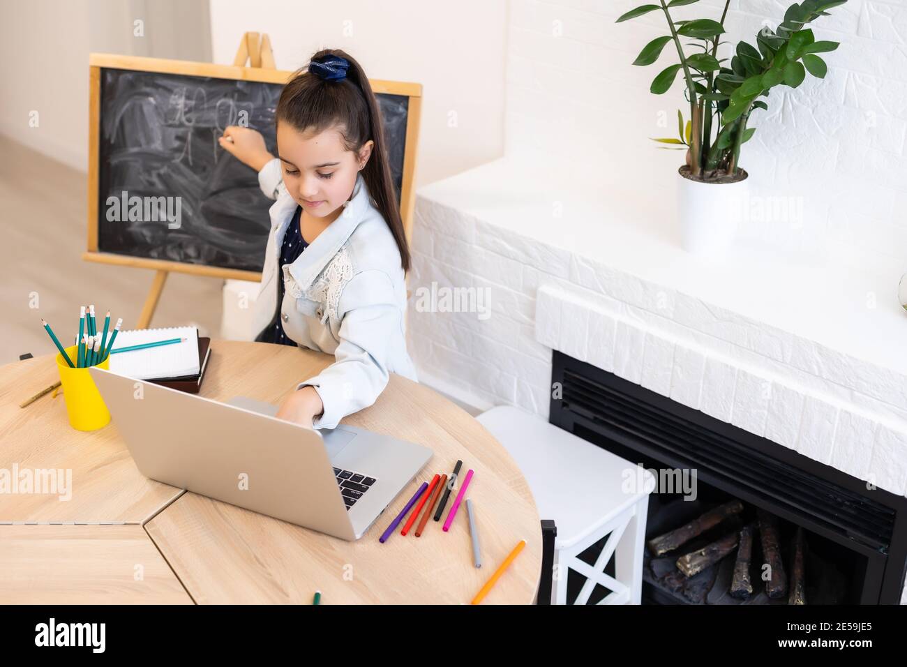 Painting girl writing book hi-res stock photography and images - Alamy