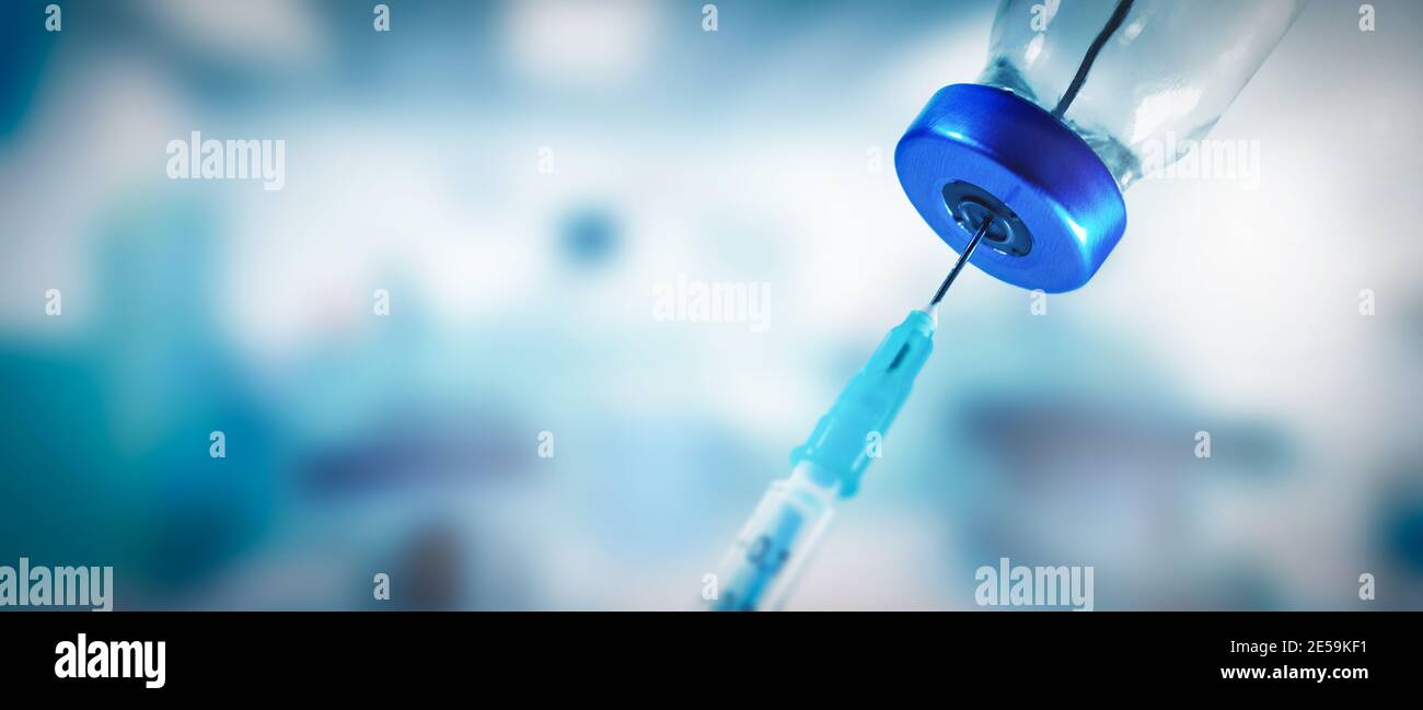 vaccination banner - filling syringe with vaccine. copy space Stock Photo