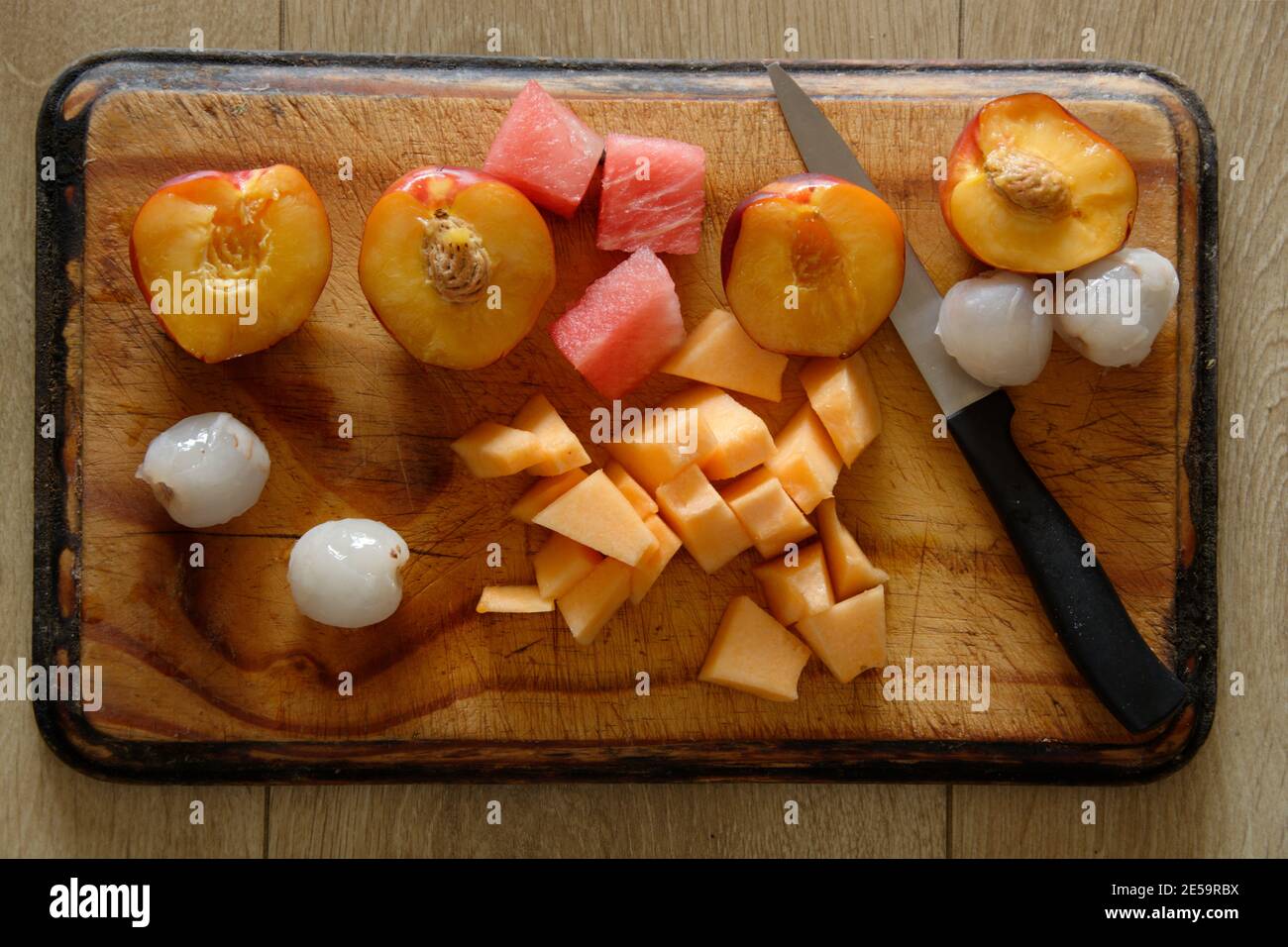 Fruit Salad Chopped with Knife Stock Photo Alamy