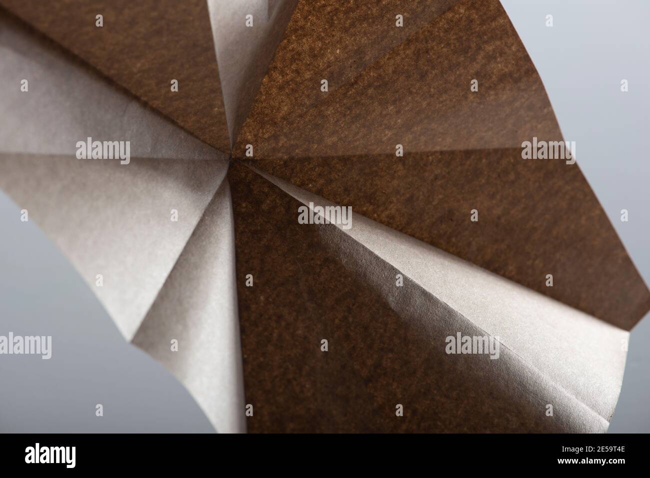 Beige paper geometry composition. Abstract background. Macro shot. Copy space. Stock Photo